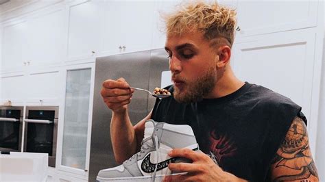 Sneakerheads fuming as Jake Paul eats cereal out of 